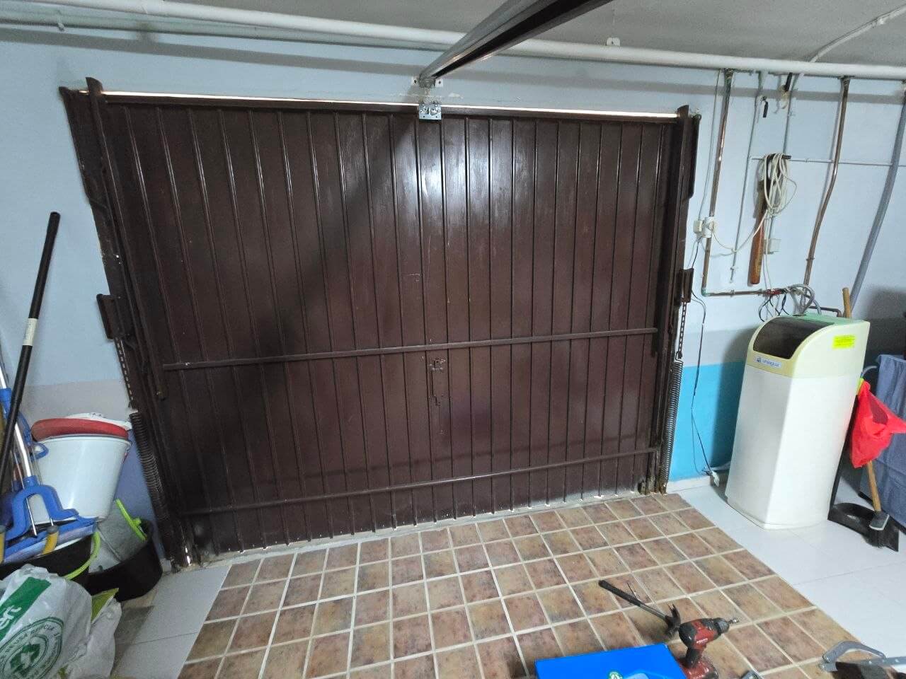 Reparación puerta basculante